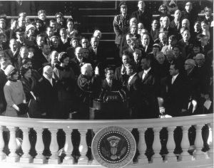 Jacqueline Kennedy at her husband John Kennedy’s inauguration (far left)