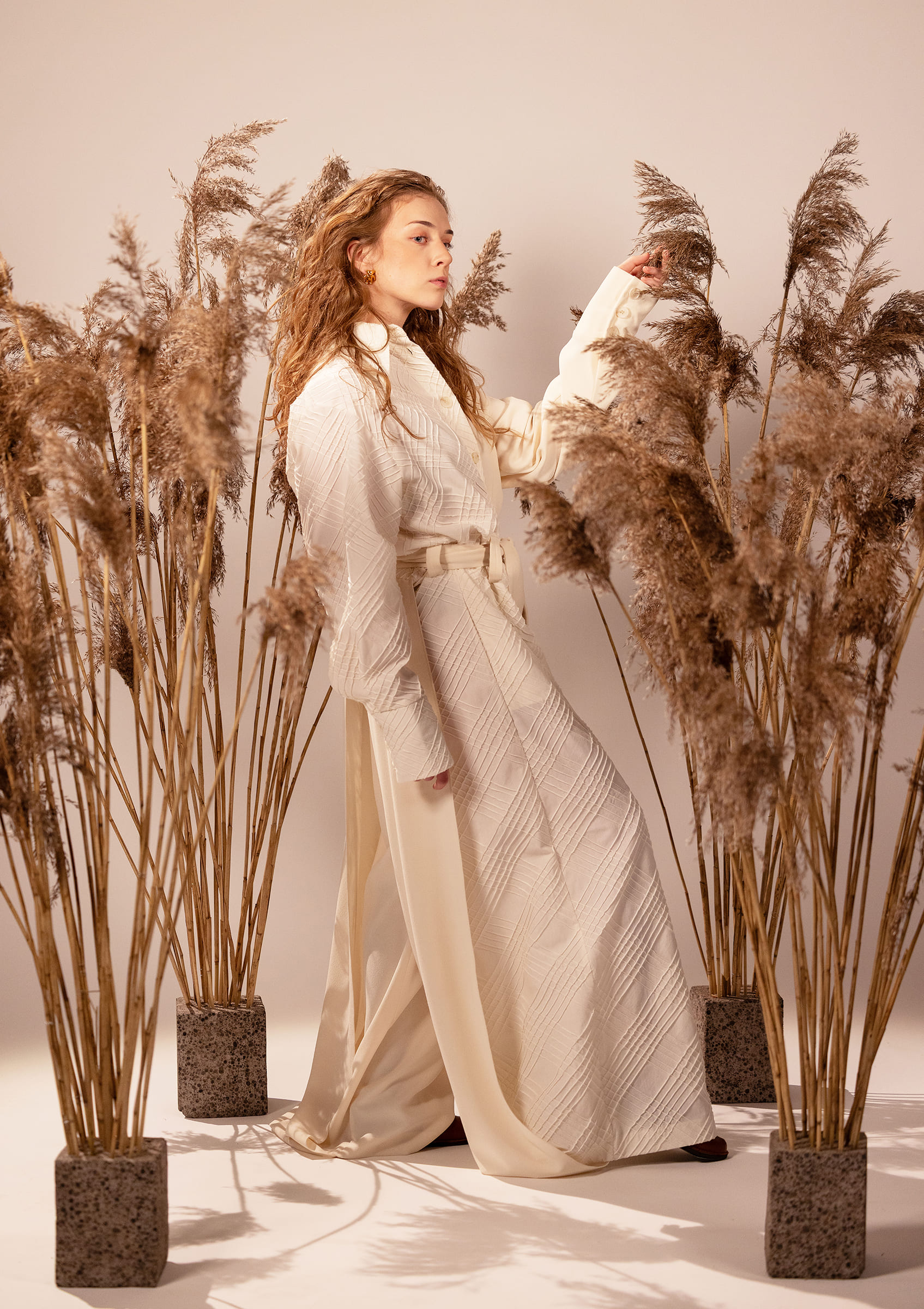 Makeup, hair and styling: Anete VäliPhotography: Silver Gutmann Model: Frederika Frey Pantsuit: Dione - Carolxott Earrings: Möm Porcelain Rings and bracelet: Eesti Juveel Moccasins: Toku