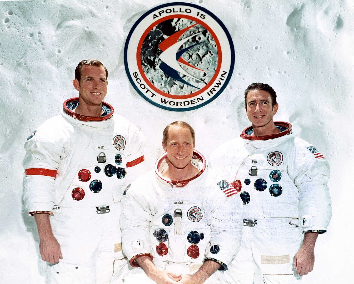The prime crew of Apollo 15 with the mission emblem, 1971.
